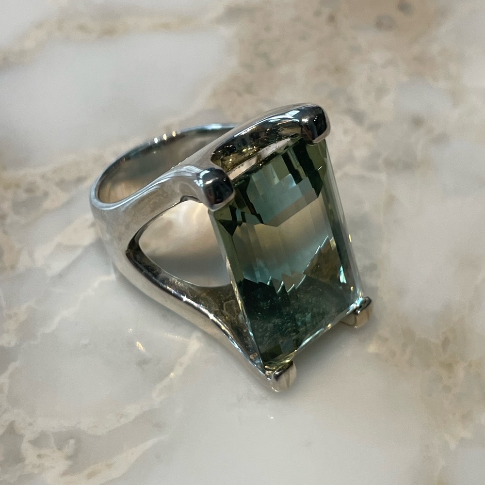 Sterling silver, Green Amethyst. stone measurement 1 inch x 1/2 x 1/2 deep.